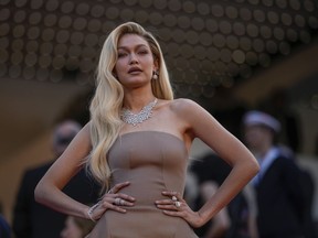 Gigi Hadid poses for photographers at the premiere of the film 'Firebrand' at the 76th international film festival in Cannes, France, May 21, 2023.