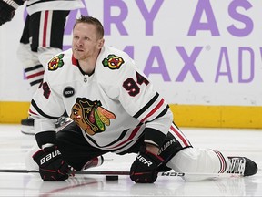 Chicago Blackhawks right wing Corey Perry warms up before an NHL hockey game against the Nashville Predators, Saturday, Nov. 18, 2023, in Nashville, Tenn