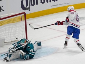 Canadiens' Jesse Ylönen (56) scores past San Jose Sharks goaltender Mackenzie Blackwood (29) during the shootout in San Jose, Calif., on Friday, Nov. 24, 2023.