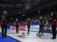 Ontario coach Ryan Fry, from left to right, talks with lead Sarah Wilkes, fourth Rachel Homan, second Emma Miskew and skip Tracy Fleury during a timeout in the playoffs at the Scotties Tournament of Hearts, in Kamloops, B.C., on Friday, February 24, 2023. Displeased with a number of unilateral decisions made by Grand Slam of Curling organizers, several top-level curlers have voiced their concerns in an attempt to see changes at the remaining three events on the circuit's calendar.