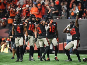 B.C. Lions' Keon Hatcher, from left to right, Justin McInnis, quarterback Vernon Adams Jr., Dominique Rhymes and Jevon Cottoy celebrate Adams Jr.'s third touchdown against the Calgary Stampeders, during the second half of the CFL western semi-final football game, in Vancouver, on Saturday, November 4, 2023.The B.C. Lions will host the Ottawa Redblacks in a regular-season CFL game in Victoria next season.THE CANADIAN PRESS/Darryl Dyck