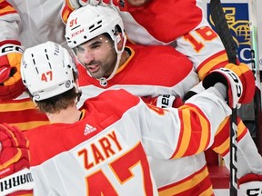Calgary Flames Nazem Kadri celebrates with teammates after scoring against the Montreal Canadiens in Montreal, Tuesday, November 14, 2023.