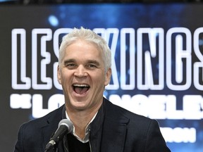 Los Angeles Kings president Luc Robitaille laughs during a news conference, Tuesday, November 14, 2023 at the Videotron Centre in Quebec City. The Los Angeles Kings will hold the final leg of their training camp at the Videotron Centre in Québec City from October 2 to 6, 2024, with two games against the Boston Bruins on October 3 and the Florida Panthers on October 5.