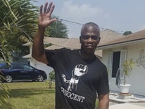 In this photo provided by the Innocence Project of Florida, Leonard Allen Cure poses on the day of his release from prison on April 14, 2020, in Fla.