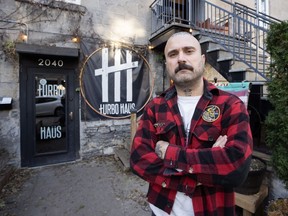 Sergio Da Silva, co-owner of the Turbo Haüs nightclub, poses for photos in front of the club Friday, Nov. 24, 2023, in Montreal. The club has received warnings related to noise complaints from the city, a problem affecting many small music venues in Montreal.