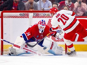 Canadiens Jake Allen stretches to make a save on a shootout attempt by Hurricanes' Sebastian Aho during game last season at the Bell Centre.