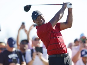 Tiger Woods plays his shot from the 15th tee during the final round of the Hero World Challenge.