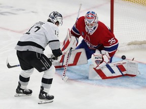Los Angeles Kings' Trevor Moore (12) beats Montreal Canadiens goaltender Sam Montembeault during third period NHL action in Montreal on Thursday Dec. 7, 2023.