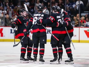 Jacob Bernard-Docker (#24) of the Ottawa Senators celebrates a goal with teammates at the Canadian Tire Centre.