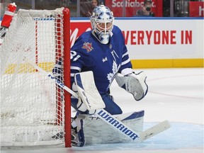 Martin Jones of the Toronto Maple Leafs protects the corner of his net against the Pittsburgh Penguins during the third period in an NHL game at Scotiabank Arena on December 16, 2023 in Toronto, Ontario, Canada.