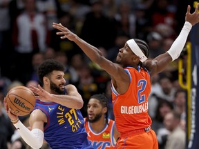Canadian NBA stars Jamal Murray #27 of the Denver Nuggets Shai Gilgeous-Alexander #2 of the Oklahoma City Thunder in a December, 2023 game.