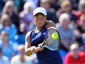 Britain's Tara Moore returns to Russia's Ekaterina Makarova during their women's 1st round singles match at the WTA Eastbourne International tennis tournament in Eastbourne, southern England on June 20, 2016.