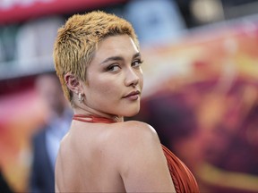 Florence Pugh poses for photographers upon arrival at the premiere of the film 'Oppenheimer' on July 13, 2023 in London.