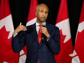 Minister of International Development Ahmed Hussen delivers remarks at a fundraiser event, in Toronto on Friday, Dec. 1, 2023. THE CANADIAN PRESS/Christopher Katsarov