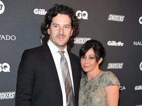 In this Oct. 27, 2010 file photo, actress Shannen Doherty and Kurt Iswarienko attend 'The Gentleman's Ball' hosted by GQ Magazine at the Edison Ballroom in New York.