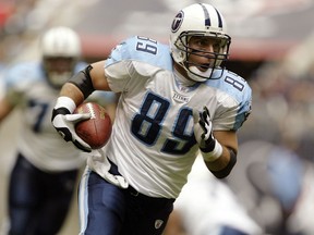 Tight end Frank Wycheck of the Tennessee Titans runs the ball during the game against the Houston Texans on December 21, 2003 at Reliant Stadium.