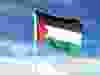 Palestine flag on cloudy sky. waving in the sky