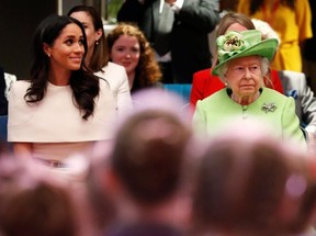 Queen Elizabeth II and Meghan, Duchess of Sussex visits the Storyhouse on June 14, 2018 in Chester, England.