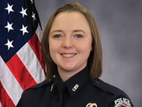 Fired police officer Maegan Hall is suing, claiming she was sexually groomed.