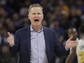 Golden State Warriors head coach Steve Kerr gestures toward an official during a game against the Toronto Raptors in San Francisco, Thursday, March 5, 2020.