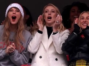 Taylor Swift, Brittany Mahomes and Ashley Avignone cheer on the Kansas City Chiefs at Foxboro Stadium Sunday, Dec. 17.