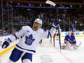 Maple Leafs' Auston Matthews scores against Igor Shesterkin of the New York Rangers at Madison Square Garden on Dec. 12, 2023 in New York City.