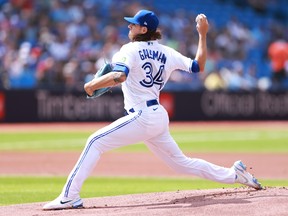 Kevin Gausman of the Toronto Blue Jays delivers a pitch against the Baltimore Orioles at Rogers Centre on August 3, 2023 in Toronto.