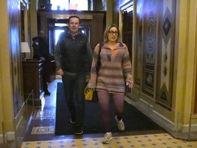 Sen. Chris Murphy, D-Conn., left, and Sen. Kyrsten Sinema, I-Ariz., right, arrive for closed-door negotiations on a border security deal at the Capitol, Sunday, Dec. 17, 2023, in Washington. Negotiators are rushing to reach a U.S. border security deal that would unlock President Joe Biden's request for billions of dollars worth in military aid for Ukraine and national security.