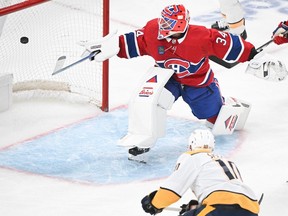 Predators' Colton Sissons (10) scores against Canadiens goaltender Jake Allen in Montreal on Sunday, Dec. 10, 2023. The 2-1 Nashville win was Allen's seventh consecutive loss.