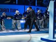 Roberto Luongo walks onto the ice before an NHL game to celebrate the his entry to the Ring of Honour at Rogers Arena in Vancouver on Thursday, Dec. 14, 2023.