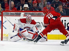Canadiens goalie Cayden Primeau thwarts a great chance by Hurricanes' Jack Drury during third-period action Thursday night in Raleigh, N.C.