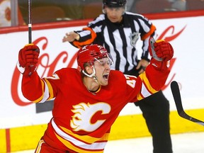 Calgary Flames Connor Zary scores his first goal on Dallas Stars goalie Jake Oettinger at the Scotiabank Saddledome in Calgary on November 1, 2023.