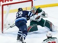 Winnipeg Jets' Nino Niederreiter (62) scores against Minnesota Wild goaltender Filip Gustavsson (32) during first period NHL action in Winnipeg on Saturday, December 30, 2023.