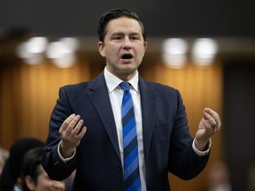 Conservative Leader Pierre Poilievre rises during question period, Tuesday, Dec. 5, 2023, in Ottawa. Poilievre has been busy trying to leverage his massive social media following as the Conservatives battle with the Liberals over who's best positioned to address the country's housing crisis.