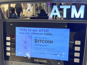 Canada's financial intelligence agency says it expects to see criminals increase their use of cryptocurrency to raise, move and hide funds outside the traditional banking system. Bitcoin is for sale at an Automated Teller Machine at the Westfield Garden State Plaza shopping mall in Paramus, New Jersey, on March 13, 2023.