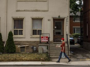 A for rent sign outside a home in Toronto on Tuesday July 12, 2022.