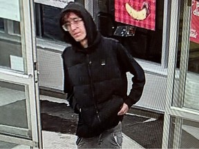 Winnipeg Police released an image of a man police believe stabbed a female grocery store employee who confronted him for shoplifting on Wednesday, Nov. 29, 2023. He is seen in video surveillance from the store.