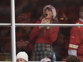 Taylor Swift is seen in a suite before the start of an NFL football game between the Kansas City Chiefs and the Las Vegas Raiders Monday, Dec. 25, 2023, in Kansas City, Mo.