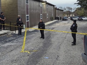 Police rope off the scene where two dead bodies were discovered on Tuesday, Dec. 26, 2023 in San Antonio, Texas. The dead bodies that Texas investigators believe to have been a pregnant woman and her boyfriend were found with gunshot wounds days after they were reported missing, police said Wednesday.