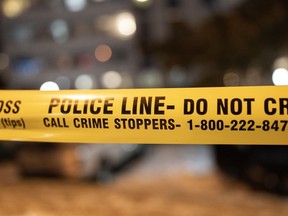 Police tape is shown at the scene of a shooting in Toronto on Saturday, Jan. 14, 2023.