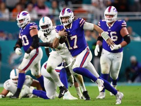 Josh Allen of the Buffalo Bills rushes during the fourth quarter against the Miami Dolphins.