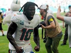 Wide receiver Tyreek Hill of the Miami Dolphins celebrates after his team beat the Buffalo Bills at Hard Rock Stadium on Sept. 25, 2022, in Miami Gardens, Fla.