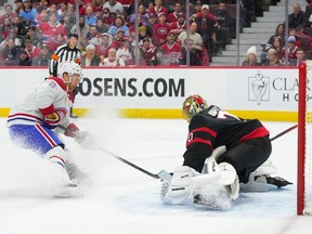 Joonas Korpisalo #70 of the Ottawa Senators makes a pad save against Mike Matheson #8 of the Montreal Canadiens during the first period at Canadian Tire Centre on Jan. 18, 2024 in Ottawa.