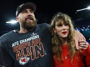 Travis Kelce celebrates with Taylor Swift after the Kansas City Chiefs defeated the Baltimore Ravens in the AFC Championship Game on Jan. 28, 2024.
