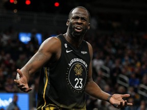 Draymond Green #23 of the Warriors reacts to a call during the third quarter against the Pelicans at Chase Center in San Francisco, March 28, 2023.
