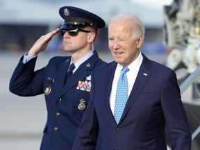 President Joe Biden arrives at Miami International Airport Tuesday, Jan. 30, 2024.