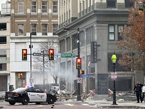 First responders work the scene after an explosion at the Sandman Signature hotel on Monday, Jan. 8, 2024, in Fort Worth, Texas.
