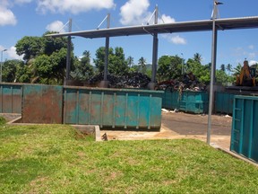 In this file photo taken on April 1, 2020, dumpsters used to store household waste are pictured in a shanty town in Kahani, on the French Indian Ocean island of Mayotte.