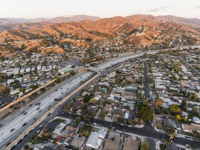 Aerial view Interstate 5 freeway and Verdugo Mountain in the San Fernando Valley near Burbank and Los Angeles, California.