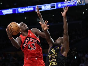 Pascal Siakam of the Toronto Raptors drives to the basket as Taurean Prince of the Los Angeles Lakers defends at Crypto.com Arena on January 9, 2024 in Los Angeles.